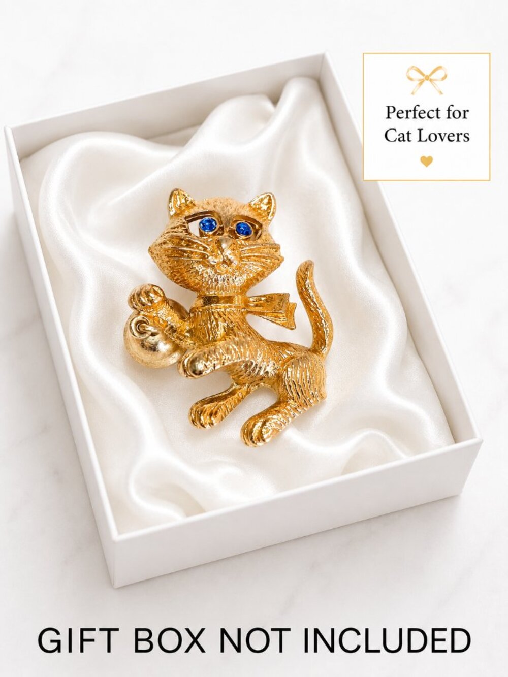 Avon Cat Brooch with Movable Bell Goldtone Blue Eyes Pin Signed Vintage